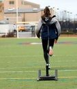 Female pulling a weighted sled