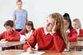 Female Pupil Finding School Exam Difficult