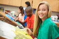 Female Pupil In High School Art Class