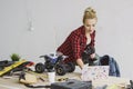 Female with radio-controlled car using laptop Royalty Free Stock Photo
