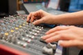 Female Radio Host Using Music Mixer In Studio Royalty Free Stock Photo