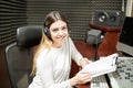 Female radio presenter moderating a show