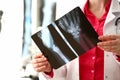 Female radiologist hold in hand xray film Royalty Free Stock Photo