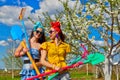 Female raking soil on garden Royalty Free Stock Photo