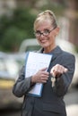 Female Real Estate Agent holding house key