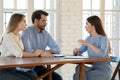 Female realtor consult couple about home purchase