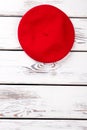 Female red felt beret, copy space.