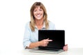 Female representative presenting new laptop Royalty Free Stock Photo