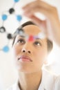 Female Researcher Analyzing Molecular Structure In Laboratory Royalty Free Stock Photo