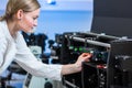 Female researcher carrying out research in a physics/chemistry lab Royalty Free Stock Photo