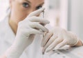 Female researcher doing research in a chemistry lab. Gas chromatograph Royalty Free Stock Photo