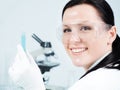 Female researcher holding test tube