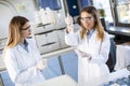 Female researchers in white lab coat working in the laboratory