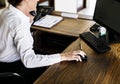 Female resort receptionist on the phone Royalty Free Stock Photo