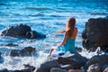 Female resting on stone. Natural landscape. Beach vacation and spa. Time to relax. Relaxation and meditation concept Royalty Free Stock Photo