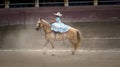 Female rider in light blue dresses