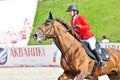 Female rider on show jump horse