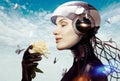 Female robot with flower Royalty Free Stock Photo