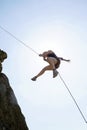 Female Rock Climber Rappelling Royalty Free Stock Photo