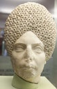 Female Roman Head with complicated curly hairstyle