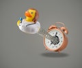 Female Rubber duck doctor coming out of alarm clock Royalty Free Stock Photo