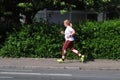 FEMALE RUNNER KEEP FIT HEALTH WISE BY RUNNING