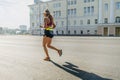 female runner running in morning