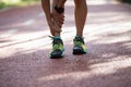 runner suffering with pain on sports running injury