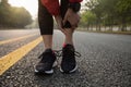 runner touching sport injured calf