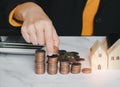 Female`s hand put coin stack money staircase on table, Business Growth concept, Financial risk. for plan saving finance and bankin Royalty Free Stock Photo