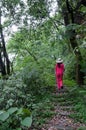 A female's shadow in forest