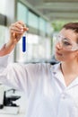 A female science student looking at a test tube Royalty Free Stock Photo
