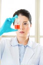 Female scientist Braving new medical frontiers bottle Royalty Free Stock Photo