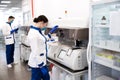 Female scientist doing molecular allergy diagnostics in lab Royalty Free Stock Photo