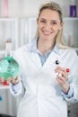 female scientist examining three dimensional model dna Royalty Free Stock Photo