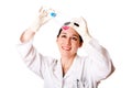 Female scientist looking at tissue culture flask Royalty Free Stock Photo