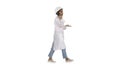 Female scientist making a call walking on white background. Royalty Free Stock Photo