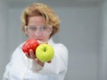 Female scientist offering natural food Royalty Free Stock Photo