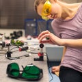 Female scientist in a quantum optics lab