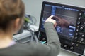 Female scientist in a quantum optics lab (color t