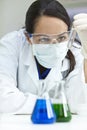 Female Scientist with Test Tube In Laboratory Royalty Free Stock Photo