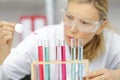 female scientist working in light laboratory