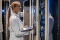 Female Scientist Working with Supercomputer