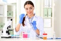 Female scientist working at table in laboratory Royalty Free Stock Photo