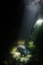 A Female Diver Basks in the Sunlight While Scuba Diving in Heber River in Vancouver Island