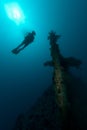 Female scuba diver exploring ship wreck Royalty Free Stock Photo