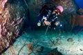 Female SCUBA diver on a tropical coral reef in the Andaman Sea, Asia Royalty Free Stock Photo