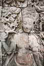 Female sculpture on the facade of Angkor Thom Bayon, Angkor. Cambodia Royalty Free Stock Photo