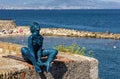 Female sculpture at Amiral de Grasse Promenade over Azure Cost of Mediterranean Sea in Antibes resort town in France