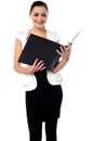 Female secretary reviewing companys file Royalty Free Stock Photo